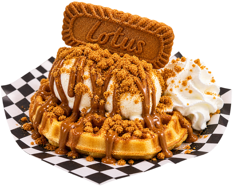 Illustrative waffle dessert with ice cream and biscuit topping